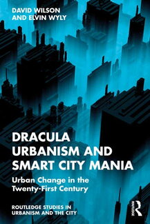 Book cover of Dracula Urbanism and Smart City Mania: Urban Change in the Twenty-First Century by David Wilson and Elvin Wyly, part of the Routledge Studies in Urbanism and the City series, featuring a dramatic digital illustration of dark angular skyscrapers bathed in an eerie blue light against a dark background.